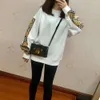 Menina de moda Capuz Designer suéter masculino emedecedores femininos letra listrada Sweatshirt casual solto de algodão de algodão de ponta com capuz