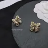 Modekanalsmycken Nya doftande mormor C Family Light Luxury Brass Bow örhängen Kvinnlig Internet Kändis mångsidig S925 Silver Ear Studs