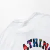 En bad AP Miami Store Special Head T-shirt tecknad bokstäver på baksidan