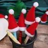 Nouvelles bannières banderoles confettis 10 pièces Mini chapeau de Père Noël en tissu non tissé sucettes casquettes couvertures de bouteilles de vin porte-bouteilles de noël décor de table dîner décor de fête de noël