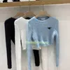 22SS 여성 스웨터 TURTLENCK 여성 스웨터 짧은 스타일 스웨트 셔츠 레이디 슬림 까마귀 점퍼 니트 셔츠 디자인 의류