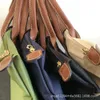 Luxuriöse Designer-Handtaschen von Jiaozi Longxiang, Einkaufstasche, große Kapazität, Mama-Tasche, 70. Jahrestag, klassische bestickte Falttasche, Nylon-Tasche, Umhängetasche