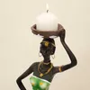 Portacandele NORTHEUINS Resina Donna nera Candeliere Figurine Decorazione esotica africana Portacandele Statua Tavolo da pranzo Top Decor Oggetti YQ240116