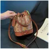Кошельки Роскошный дизайн Винтажная сумка-ведро Женская мода в стиле ретро One Shoder Сумки через плечо Цветная сумка с принтом Drop Delive Dhnh5