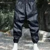 Pantalones de hombre con estilo de cuero a prueba de viento pies pequeños pantalones casuales de motocicleta con corsé de tobillo de nueve partes