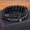 Charm Bracelets Tyo 2pcs/set Women Mens CZ Royal Crown Skull Charms 8mm Black Matte Bead Strand Bracelets 부부 발렌타인 데이 선물