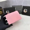 Carteras Monedero de cuero Monedero corto Hardware dorado Titular de la tarjeta clásico Monedero para hombres y mujeres