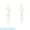 2024 New Age Jewelry Designer Long Bowknot Pearl Tassel Women's Inspired Style Premium Feel Mesh Red Earrings