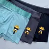 Cuecas designer marca na moda roupa interior de seda de gelo para homens cintura respirável moldando shorts esportivos com cantos planos e quatro cantos cor sólida de alta qualidade