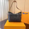 Borsa a mano Esplosione Tendenza moda Stampa Design Marchio di lusso Bellissimo tessuto in pelle di mucca Borsa semplice integrata di grande capacità M46293