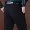 Otoño Invierno grueso doble plisado pantalones de vestir hombres de cintura alta suelta traje Casual de negocios pantalones de mediana edad para hombres 240117