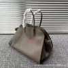 A bolsa Marga 15 genuíno bolsa de couro de grande capacidade feminina, comando uma bolsa de crossbody de um ombro minimalista e pequena