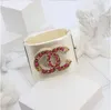 Large marque de mode blanche en acrylique exquise bijoux de bracelet pour femmes bracelet de manchette à grande large résine célèbre nom de lettre de marque chandle Bangleip8i