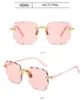 2023 Nya Rimless Women's Solglasögon Fashion Gradient Lenses Sun Glasses Lady Vintage Alloy Legs Classic Designer Shades UV400