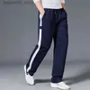 Pantaloni da uomo Pantaloni sportivi larghi da corsa Pantaloni sportivi a righe Pantaloni da allenamento fitness Pantaloni dritti da uomo Tuta da jogging Abbigliamento sportivo Goggers Q240117