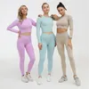 アクティブセット女性Vital Seamless Yogaセットフィットネス衣類ハイウエストジムレギンスパッド入りプッシュアップスポーツブラをランニングスポーツウェアトラックスーツ