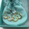 TIFF örhängen Designer Kvinnor Toppkvalitet Charm S925 Silver Half Diamond Earrings Set med Diamond Smooth C-Style Luxury Fashion Earrings