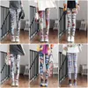 2024 Yeni Tasarımcı Lady Moda Tayt Seksi Deniz Kıyısı Son derece Elastik ve Renkli Bacak Isıtıcı Fit Avrupa ve Amerikan Markaları Kadın Yoga Pantolon EJSM
