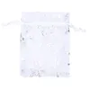 Bolsas de jóias 100 pcs organza sacos de presente de casamento bolsa de cordão prata branco flocos de neve impressos sheer festa favor