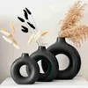 Vases Ceramic Hollow Out Flower Vase Figurines Nordic Modern Planter Pots Home Decore Creative Donut Flower Vase Decorative Decoration YQ240117