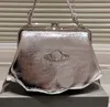 Bolsos de diseñador famosos Bolsos de hombro Bolsos de concha Estilo casual Alta calidad para damas Bolsos Charol Nuevo Patrón de cocodrilo Saturno Bolso de cuero lacado Vivi