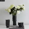 Vases Vase en céramique à rayures noires et blanches Pots de fleurs œuvre d'art Arrangement de fleurs décoration de bureau ornements Vases floraux en porcelaine YQ240117