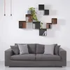 Dekorativa plattor moderna enkla tv -vägghylla diy kombination bokhylla hänger på