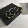 Moda Ear Stud per le donne Orecchini a cerchio con fascino di lusso Oro F Hoops Designer di marca Gioielli orecchino con diamanti uomo Argento Elegante collana con braccialetto Aretes G2206211XQ