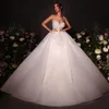 Incredibili abiti da ballo con perle Abiti da sposa Abito da sposa con applicazioni di pizzo Senza spalline Sweep Train Tulle Vestido de Novia per la sposa