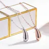 Luxury smyckesdesigner t hänge halsband koreanska s925 sterling silver droppande kvinnor hänge klassiskt modemodtemperament t hem slät ansikte dri n7gi