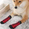 Vêtements pour chiens Grip Chaussettes Chaussures d'hiver Anti Slip Protecteur de Noël Chaussette Garde pour animaux de compagnie moyens et petits chiens chats