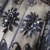 Bufandas Capa de noche estilo flapper vintage con intrincados detalles de lentejuelas capturan la esencia de los años 20 con esta impresionante