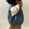 Waistcoat 2023 Nieuwe baby mouwloze denimvest Casual Kids Vest Jacket Losse jongens Pocket Vest Coat Autumn Fashion Girls Denim Vest Kleding H240508