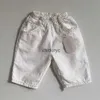 Pantaloni 2023 autunno nuovo bambino sciolto pantaloni alla moda ragazzo denim pantaloni da bambino jeans abiti casual ldrens h240508