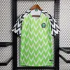 Fãs Tops Tees Nigéria 2024 JERSEYS DE FUTEBOL 18 19 22 23 24 Camisa de futebol nigeriano OKOCHA colete BABAYARO Fãs Jogador Versão 18 Traje de treinamento 94 96 98 uniforme 1 J240309