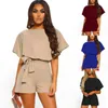 Säljer Summer Shorts Fashionabla Solid Color Belt Short Sleeved Jumpsuit Oneck Löst ärmkvinna KLÄNNINGAR Utanför 240116