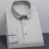 Camicie elasticizzate solide da uomo senza taschino sul petto manica lunga morbida camicia da uomo d'affari casual comoda S ~ 6xl abbigliamento uomo 240117