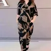 Traje de mujer versión coreana de verano Tops holgados con estampado pantalones Harem dos conjuntos a juego Ropa de talla grande a la moda para mujer 240117