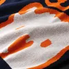 メンズ秋のカジュアルセーターホッキョクグマパターントレンディスリムコットン長袖ラウンドカラー男性暖かいプルーバーオレンジ240116