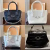 Bolsos de diseñador famosos Bolsos de hombro Bolsos de concha Estilo casual Alta calidad para damas Bolsos Charol Nuevo Patrón de cocodrilo Saturno Bolso de cuero lacado Vivi