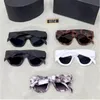 Luxe designer zonnebril voor dames Zomer Elegante stijl UV-beschermde schildlens Cat Eye-zonnebril Modieuze stijl Full-frame modebril met doos