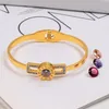 Fashion Design 3 colori braccialetti da donna numeri romani tridimensionale colorato CZ pietra cambiamento diamante scavato acciaio al titanio Bra326E