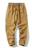 Pantalones para hombres Verano Casual Pierna ancha Suelta Cómoda Cintura elástica Harem Vintage Corea Sólido Recortado Amante Pantalón