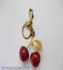 Keychains Keychain Cherry Style Red Color Chapstick Wrap Lipstick Cover Team Lipbalm Cozybag Parts Mode Fashion9126782 CI4W
