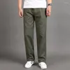 Pantaloni da uomo oversize casual taglie forti pantaloni da lavoro di media età con coulisse in cotone larghi tinta unita nero dritto