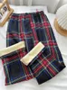 Kvinnors byxor sammet pläd brett ben för kvinnor med hög midja lös och bantningseffekt vinter förtjockad lamm kashmir avslappnad varm