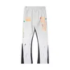 Herenbroeken Designer Zitters Bants Hoge kwaliteit Splash-inkt Graffiti Pants Heren en Women's Stijlvolle bedrukte zweetwedstrijden High Street Jogger heren zweetbroeken