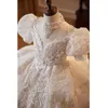 Princess White 2024 Flor Girl Dresses para casamento Novo renda Aplicado contas de concurso Vestidos de cetim de cetim Ruffled First Comunhão Vestido Festa de Aniversário