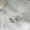 Boucles d'oreilles FYJS bijoux uniques couleur or jaune clair coquille blanche et perles fleur pour cadeau de noël