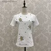 Camiseta feminina 2024 início da primavera nova indústria pesada prego grânulo manga curta camiseta requintado moda casual versátil topo t240118